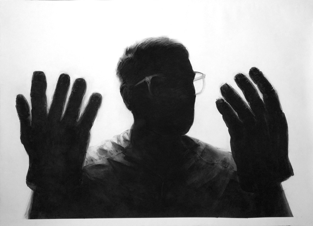 Drawing of man in silhouet with enlarged hands